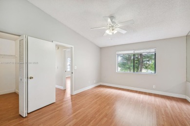 FHA AND LOW DOWNPAYMENT AVAILABLE! Discover this beautifully on Woodmont Country Club in Florida - for sale on GolfHomes.com, golf home, golf lot