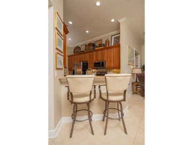 Step Into Peace Of Mind And Effortless Luxury In This on Slammer and Squire Golf Course in Florida - for sale on GolfHomes.com, golf home, golf lot
