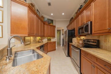 Step Into Peace Of Mind And Effortless Luxury In This on Slammer and Squire Golf Course in Florida - for sale on GolfHomes.com, golf home, golf lot