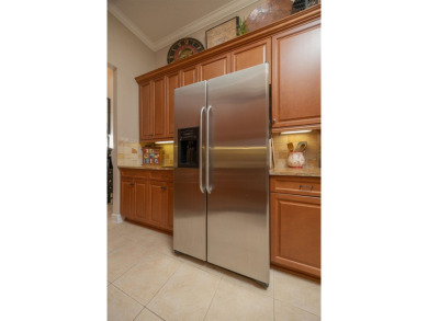 Step Into Peace Of Mind And Effortless Luxury In This on Slammer and Squire Golf Course in Florida - for sale on GolfHomes.com, golf home, golf lot