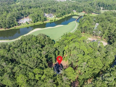 Nestled on 2.13 acres beneath a canopy of mature trees, this 1 on The Ford Field and River Club  in Georgia - for sale on GolfHomes.com, golf home, golf lot