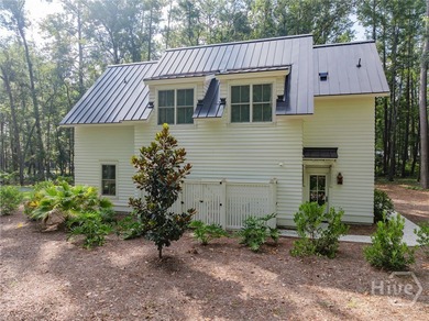 Nestled on 2.13 acres beneath a canopy of mature trees, this 1 on The Ford Field and River Club  in Georgia - for sale on GolfHomes.com, golf home, golf lot