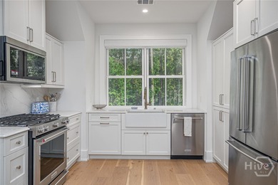 Nestled on 2.13 acres beneath a canopy of mature trees, this 1 on The Ford Field and River Club  in Georgia - for sale on GolfHomes.com, golf home, golf lot