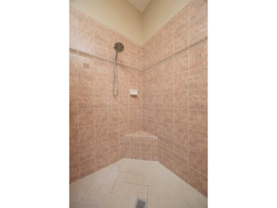 Step Into Peace Of Mind And Effortless Luxury In This on Slammer and Squire Golf Course in Florida - for sale on GolfHomes.com, golf home, golf lot