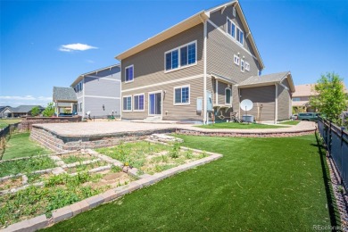 Welcome to this stunning two-story home that backs to Green on Green Valley Ranch Golf Club in Colorado - for sale on GolfHomes.com, golf home, golf lot