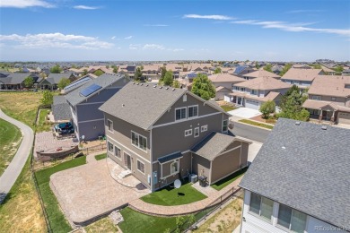 Welcome to this stunning two-story home that backs to Green on Green Valley Ranch Golf Club in Colorado - for sale on GolfHomes.com, golf home, golf lot