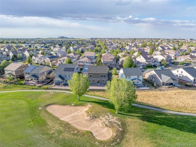 Welcome to this stunning two-story home that backs to Green on Green Valley Ranch Golf Club in Colorado - for sale on GolfHomes.com, golf home, golf lot