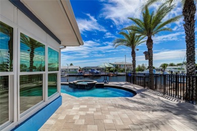 Discover your slice of Floridian heaven at 3553 Seaway Dr on Gulf Harbors Golf Course in Florida - for sale on GolfHomes.com, golf home, golf lot