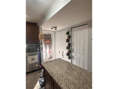 This beautifully remodeled 2 bedroom 2 bath condo is located in on Sunrise Lakes Phase IV Golf Course in Florida - for sale on GolfHomes.com, golf home, golf lot