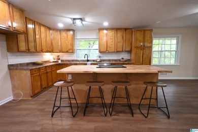 Nestled in the highly sought-after Sunset Heights neighborhood on Anniston Country Club in Alabama - for sale on GolfHomes.com, golf home, golf lot