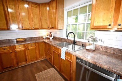 Nestled in the highly sought-after Sunset Heights neighborhood on Anniston Country Club in Alabama - for sale on GolfHomes.com, golf home, golf lot