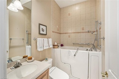 Step into a refined coastal retreat where panoramic lake views on Lely Resort Golf and Country Club in Florida - for sale on GolfHomes.com, golf home, golf lot