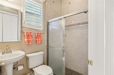 Step into a refined coastal retreat where panoramic lake views on Lely Resort Golf and Country Club in Florida - for sale on GolfHomes.com, golf home, golf lot