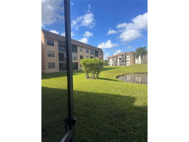 This beautifully remodeled 2 bedroom 2 bath condo is located in on Sunrise Lakes Phase IV Golf Course in Florida - for sale on GolfHomes.com, golf home, golf lot
