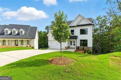 Welcome Home to 29 Creekview Drive! This stunning Alexander on The Plantation Golf Club in Georgia - for sale on GolfHomes.com, golf home, golf lot