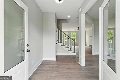 Welcome Home to 29 Creekview Drive! This stunning Alexander on The Plantation Golf Club in Georgia - for sale on GolfHomes.com, golf home, golf lot