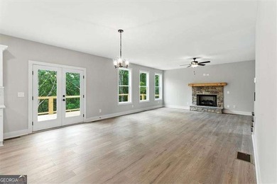 Welcome Home to 29 Creekview Drive! This stunning Alexander on The Plantation Golf Club in Georgia - for sale on GolfHomes.com, golf home, golf lot