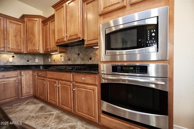 A BEAUTIFUL JUBILEE home w/ 3rd Car Garage & Backyard Oasis on Copper Canyon Golf Club in Arizona - for sale on GolfHomes.com, golf home, golf lot