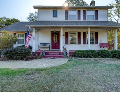 Step inside and you'll immediately notice the thoughtfully on Diamondhead Golf and Country Club in Arkansas - for sale on GolfHomes.com, golf home, golf lot