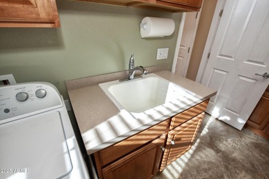 A BEAUTIFUL JUBILEE home w/ 3rd Car Garage & Backyard Oasis on Copper Canyon Golf Club in Arizona - for sale on GolfHomes.com, golf home, golf lot