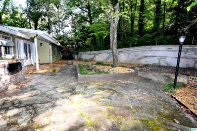 Nestled in the highly sought-after Sunset Heights neighborhood on Anniston Country Club in Alabama - for sale on GolfHomes.com, golf home, golf lot