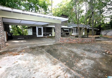 Nestled in the highly sought-after Sunset Heights neighborhood on Anniston Country Club in Alabama - for sale on GolfHomes.com, golf home, golf lot