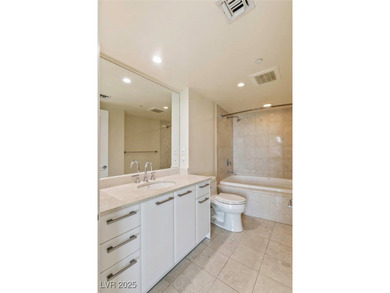 Just one block from the Las Vegas Strip, this residence blends on Las Vegas Country Club in Nevada - for sale on GolfHomes.com, golf home, golf lot