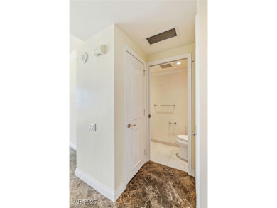 Just one block from the Las Vegas Strip, this residence blends on Las Vegas Country Club in Nevada - for sale on GolfHomes.com, golf home, golf lot