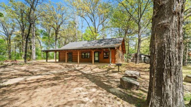 This stunning log cabin, located just moments from Yarborough on  in Arkansas - for sale on GolfHomes.com, golf home, golf lot
