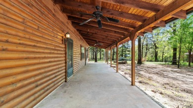 This stunning log cabin, located just moments from Yarborough on  in Arkansas - for sale on GolfHomes.com, golf home, golf lot