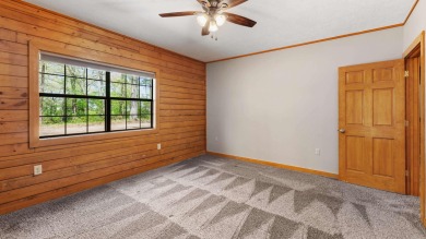 This stunning log cabin, located just moments from Yarborough on  in Arkansas - for sale on GolfHomes.com, golf home, golf lot
