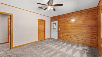 This stunning log cabin, located just moments from Yarborough on  in Arkansas - for sale on GolfHomes.com, golf home, golf lot