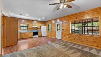 This stunning log cabin, located just moments from Yarborough on  in Arkansas - for sale on GolfHomes.com, golf home, golf lot