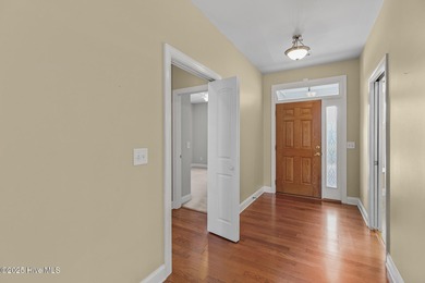 Welcome to a beautifully maintained home in the highly desirable on Magnolia Greens Golf Plantation in North Carolina - for sale on GolfHomes.com, golf home, golf lot