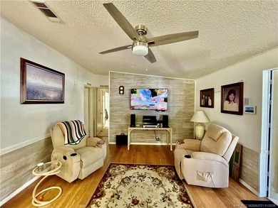 Lovely 2-bedroom, 2 bath home with 2 outdoor living spaces on Indianwood Golf and Country Club in Florida - for sale on GolfHomes.com, golf home, golf lot