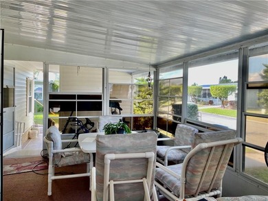 Lovely 2-bedroom, 2 bath home with 2 outdoor living spaces on Indianwood Golf and Country Club in Florida - for sale on GolfHomes.com, golf home, golf lot