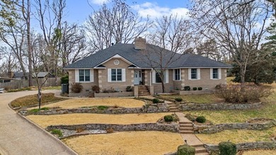 Nestled in a private neighborhood and adjacent to the #3 green on Springdale Country Club in Arkansas - for sale on GolfHomes.com, golf home, golf lot