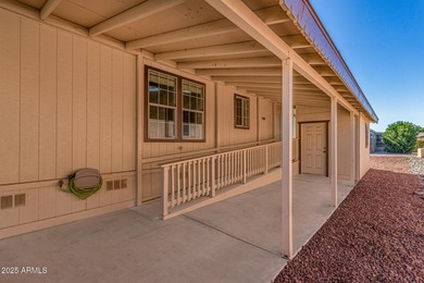 LOCATION IS STEPS TO PICKLEBALL, SHOES, MAILBOX, CLUBHOUSE, AND on Paradise Peak Golf Course in Arizona - for sale on GolfHomes.com, golf home, golf lot