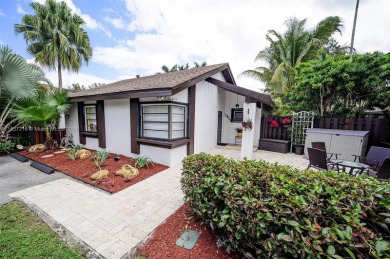 Gorgeous single-family home in the Pembroke Lakes neighborhood on Pembroke Lakes Golf Club in Florida - for sale on GolfHomes.com, golf home, golf lot