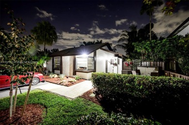 Gorgeous single-family home in the Pembroke Lakes neighborhood on Pembroke Lakes Golf Club in Florida - for sale on GolfHomes.com, golf home, golf lot