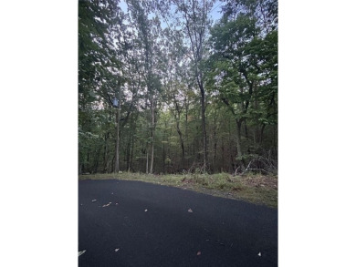 This beautiful 0.88-acre residential lot, nestled in a peaceful on The Highlands Course at Lake Arrowhead in Georgia - for sale on GolfHomes.com, golf home, golf lot
