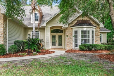 One or more photo(s) has been virtually staged. Elegant Pool on Haile Plantation Golf and Country Club in Florida - for sale on GolfHomes.com, golf home, golf lot