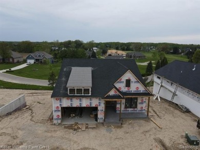 Experience the unparalleled lifestyle of living in a premier on Metamora Country Club in Michigan - for sale on GolfHomes.com, golf home, golf lot
