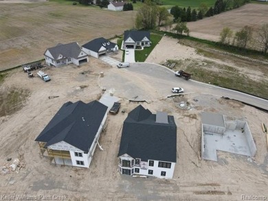 Experience the unparalleled lifestyle of living in a premier on Metamora Country Club in Michigan - for sale on GolfHomes.com, golf home, golf lot