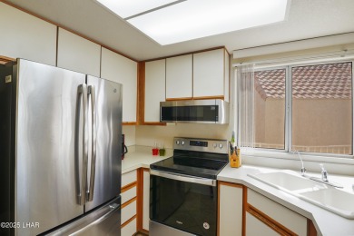Ground floor 2 bedroom, 2 bath condo with a 1-car garage, being on London Bridge Golf Course in Arizona - for sale on GolfHomes.com, golf home, golf lot