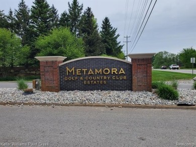 Experience the unparalleled lifestyle of living in a premier on Metamora Country Club in Michigan - for sale on GolfHomes.com, golf home, golf lot