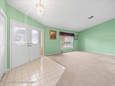 Spacious 3/2/2 well-maintained pool home with split floor plan on Seven Hills Golfers Club in Florida - for sale on GolfHomes.com, golf home, golf lot