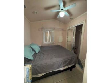 This extremely spacious park model with island room has lots of on Long Island Golf Course in Texas - for sale on GolfHomes.com, golf home, golf lot