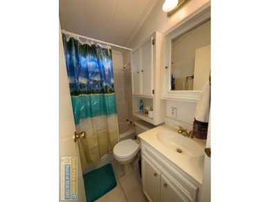 This extremely spacious park model with island room has lots of on Long Island Golf Course in Texas - for sale on GolfHomes.com, golf home, golf lot