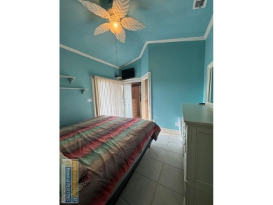 This extremely spacious park model with island room has lots of on Long Island Golf Course in Texas - for sale on GolfHomes.com, golf home, golf lot